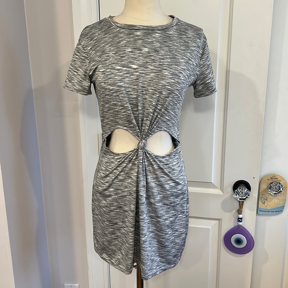 New! Dress with cut outs in perfect condition